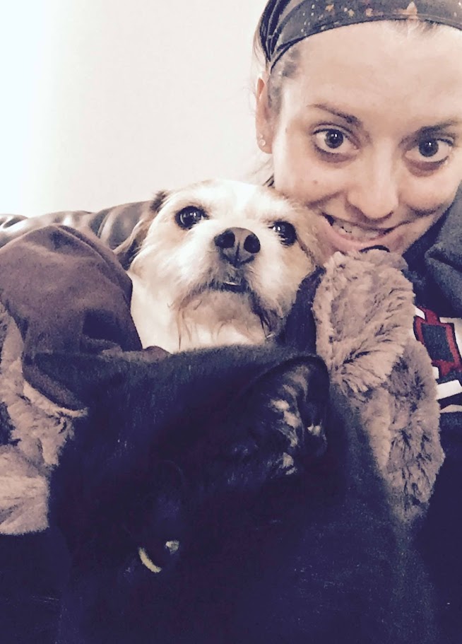 Carrie Chambers with her dog and cat.